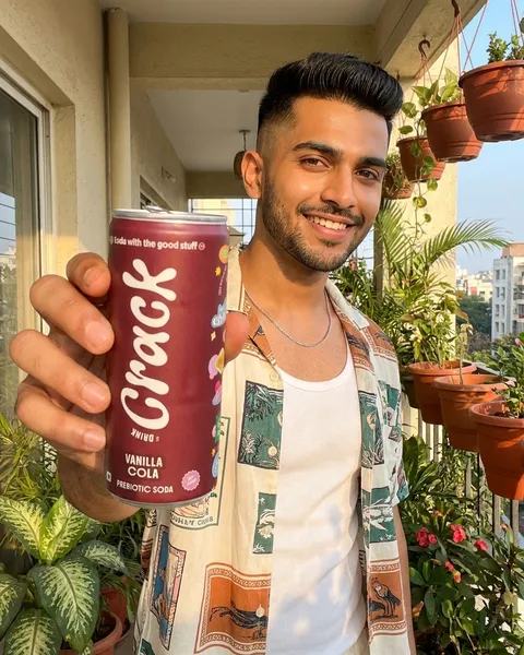 Concept visual: a person holding Crack Vanilla Cola
