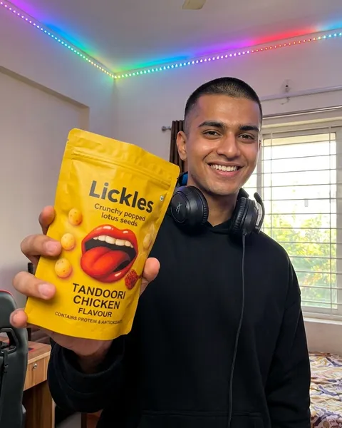 Concept visual: a person holding Lickles Roasted Makhana, Tandoori Chicken